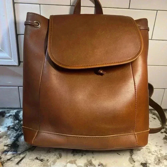 L.L. Bean Handbags - Vintage L. L. Bean Leather Cinched Snap Backpack